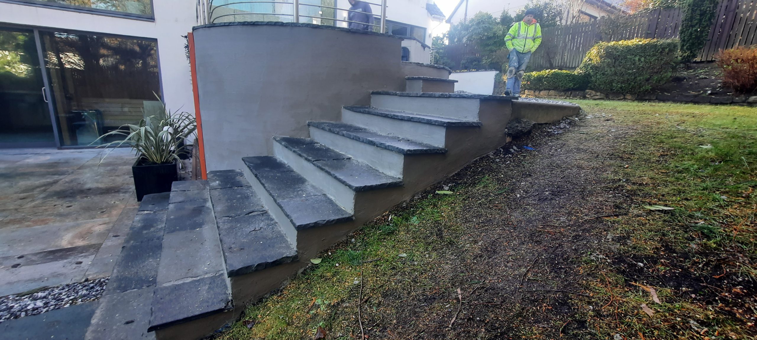 roughcasting Edinburgh on outdoor stair retaining wall