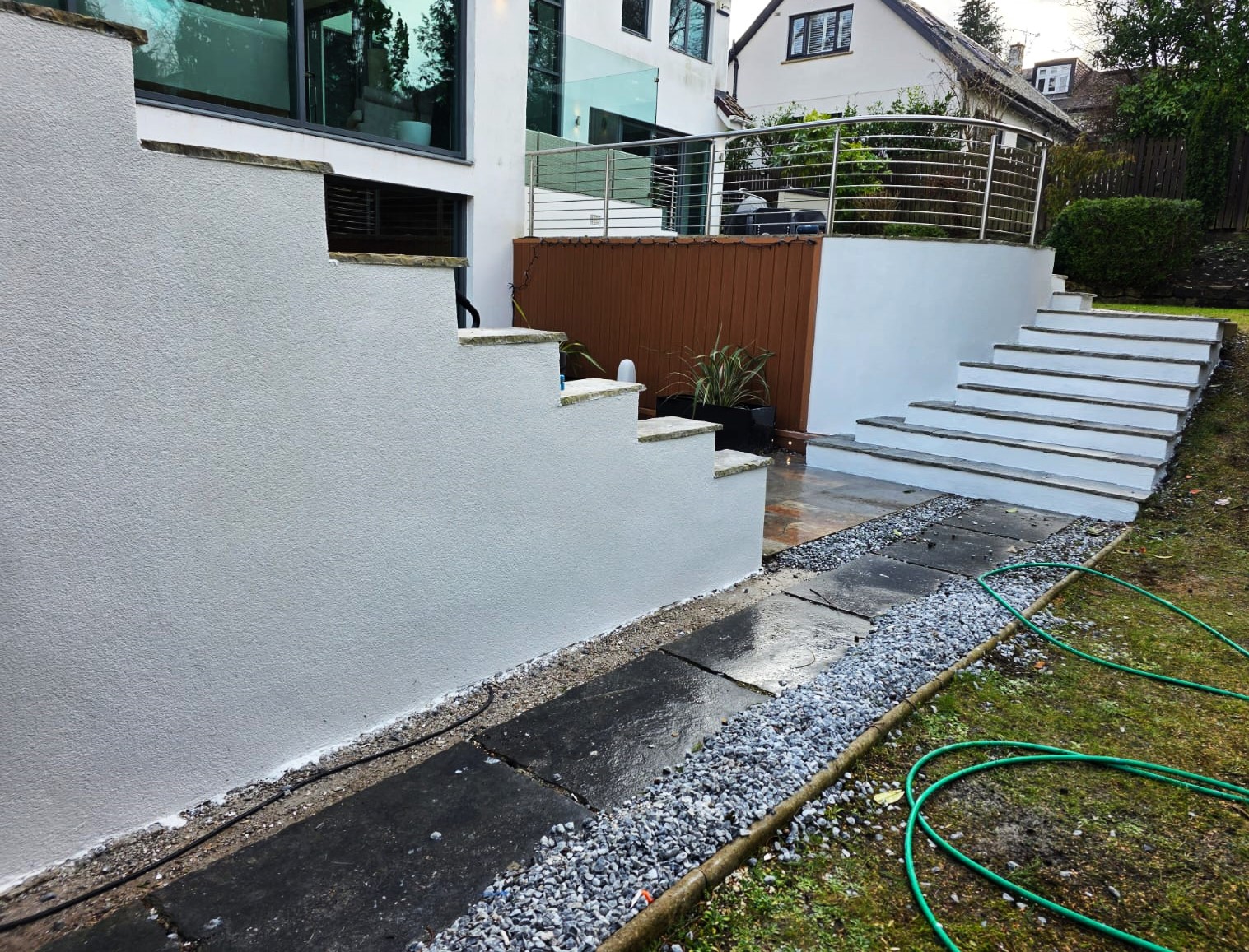 roughcaster Edinburgh working near garden pathway