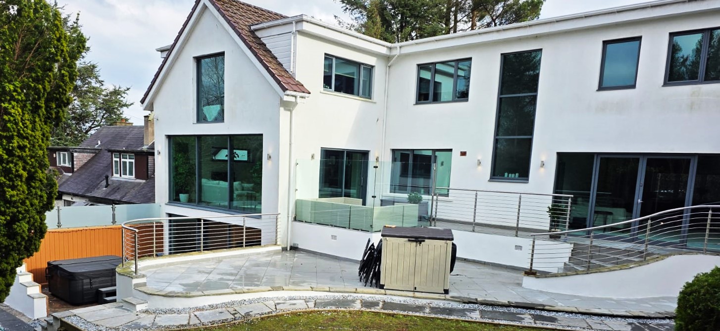 roughcast render repair on modern white building
