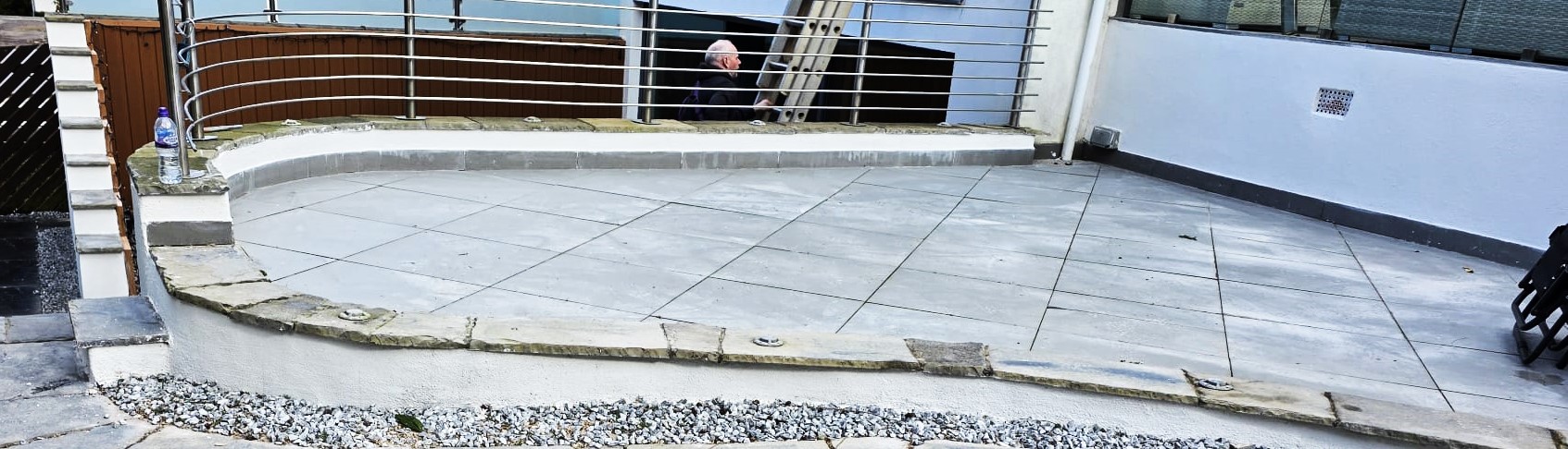 external wall insulation Edinburgh beside tiled patio