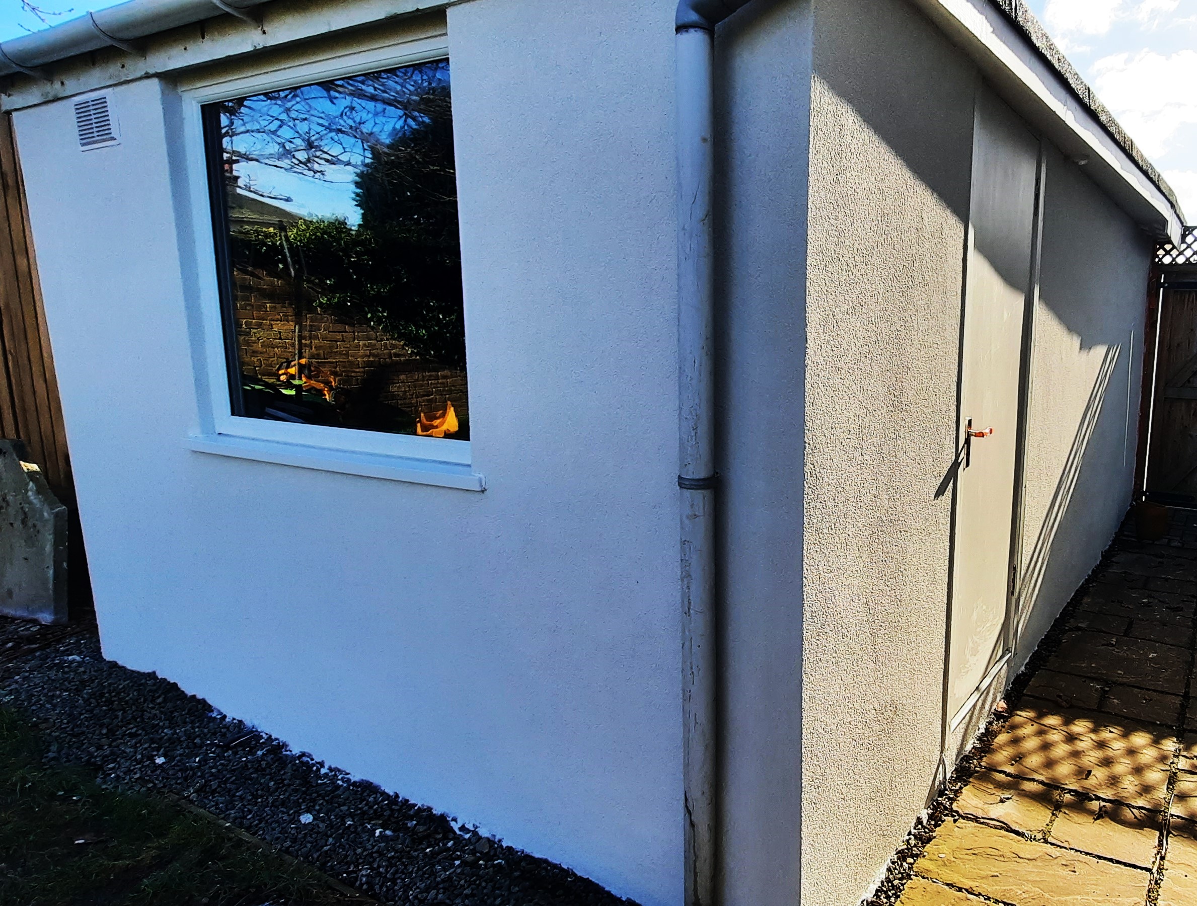 external wall insulation Edinburgh on corner house section