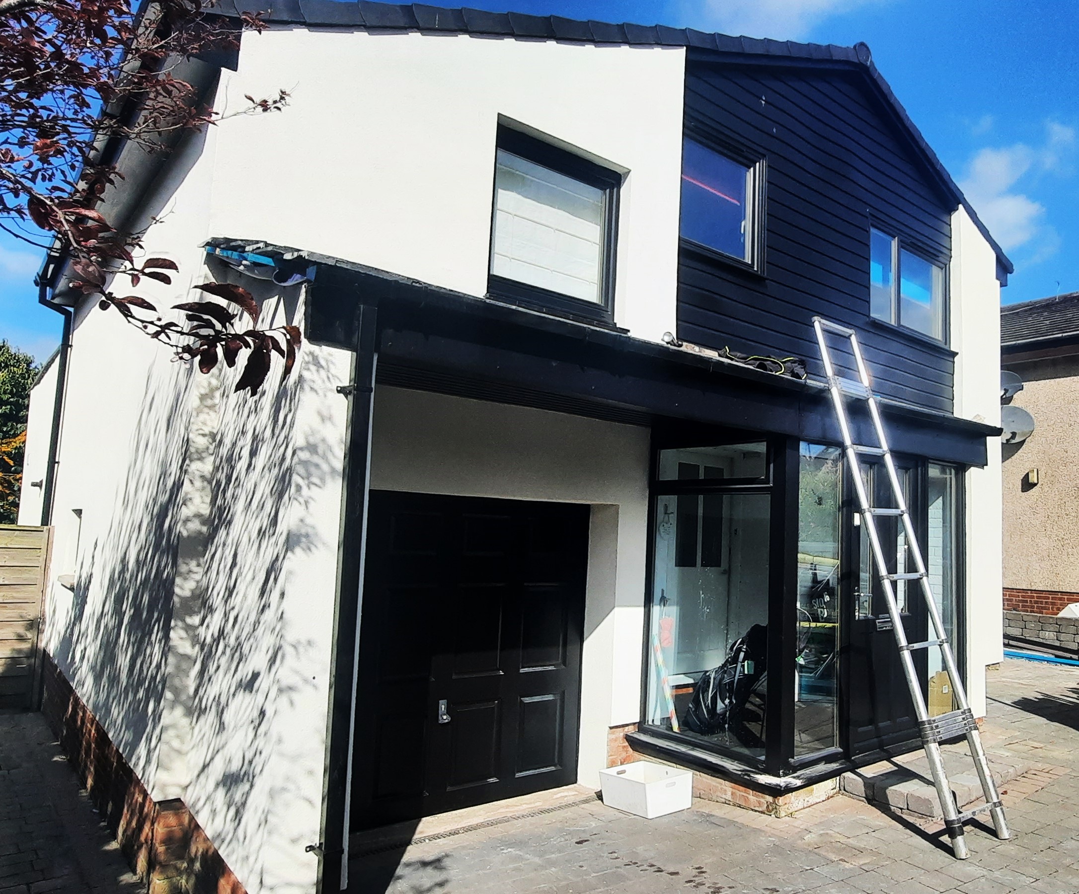 roughcast render Edinburgh modern extension entrance