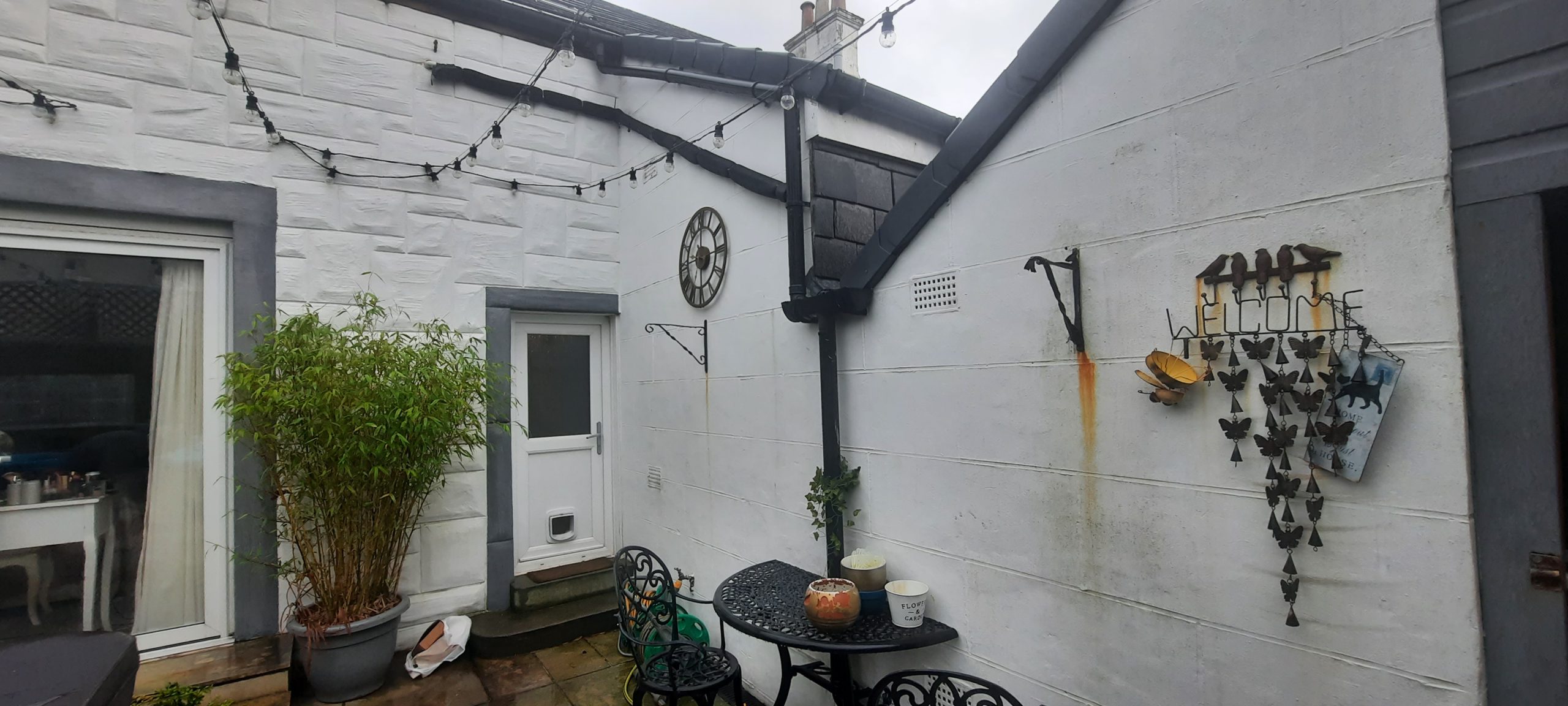 roughcasting Edinburgh on small backyard wall