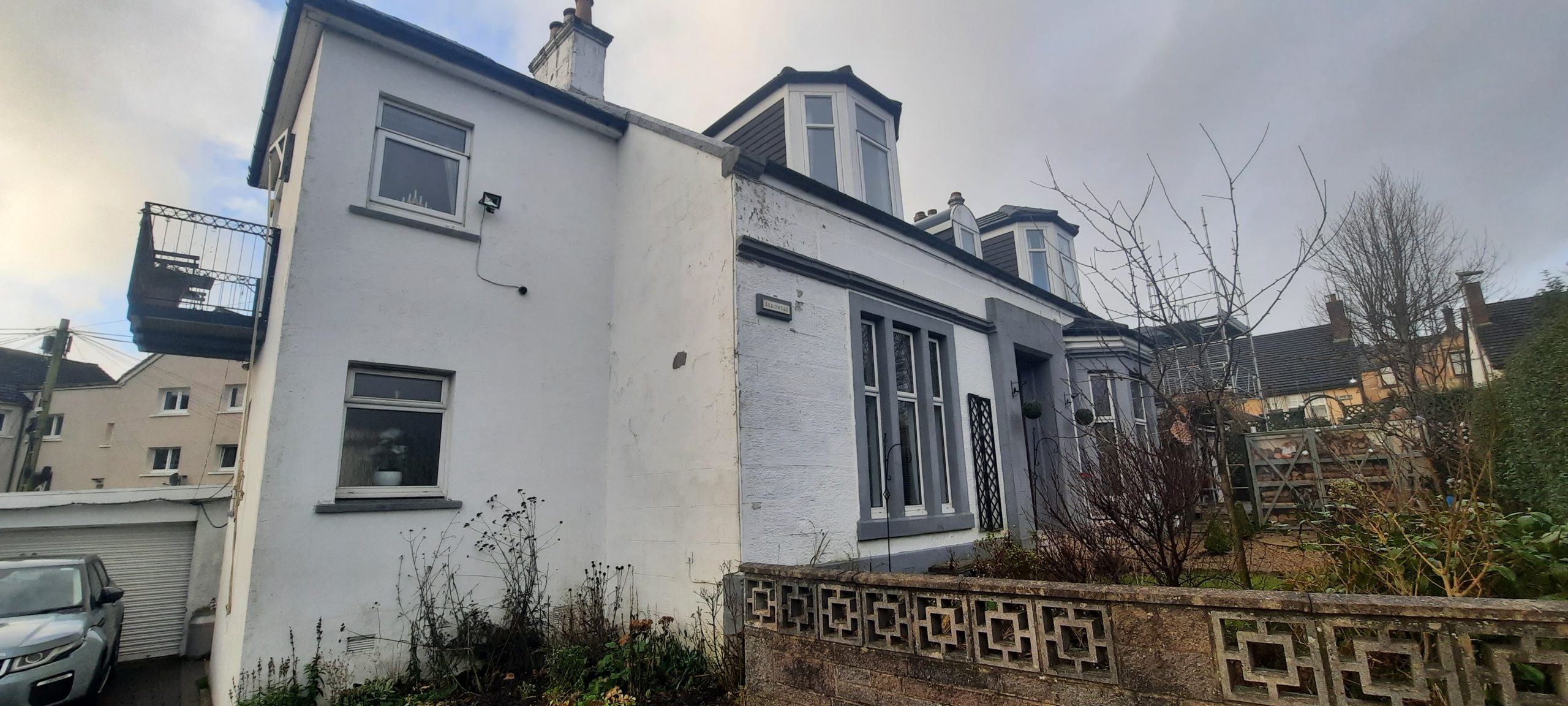 roughcast render repair completed with fresh white coat