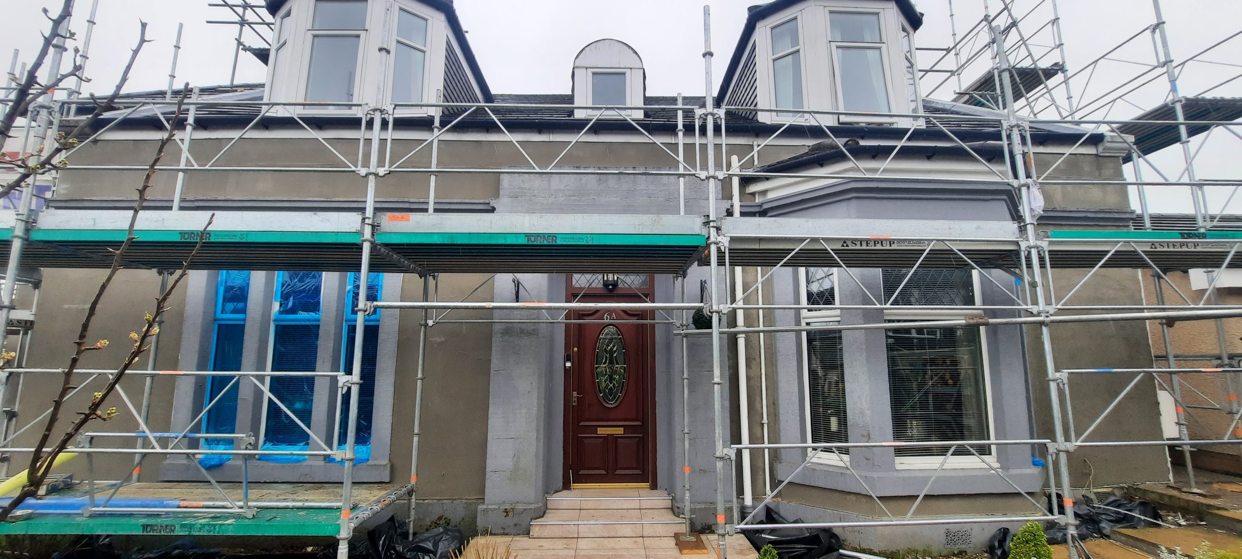 roughcast render Edinburgh entrance renovation