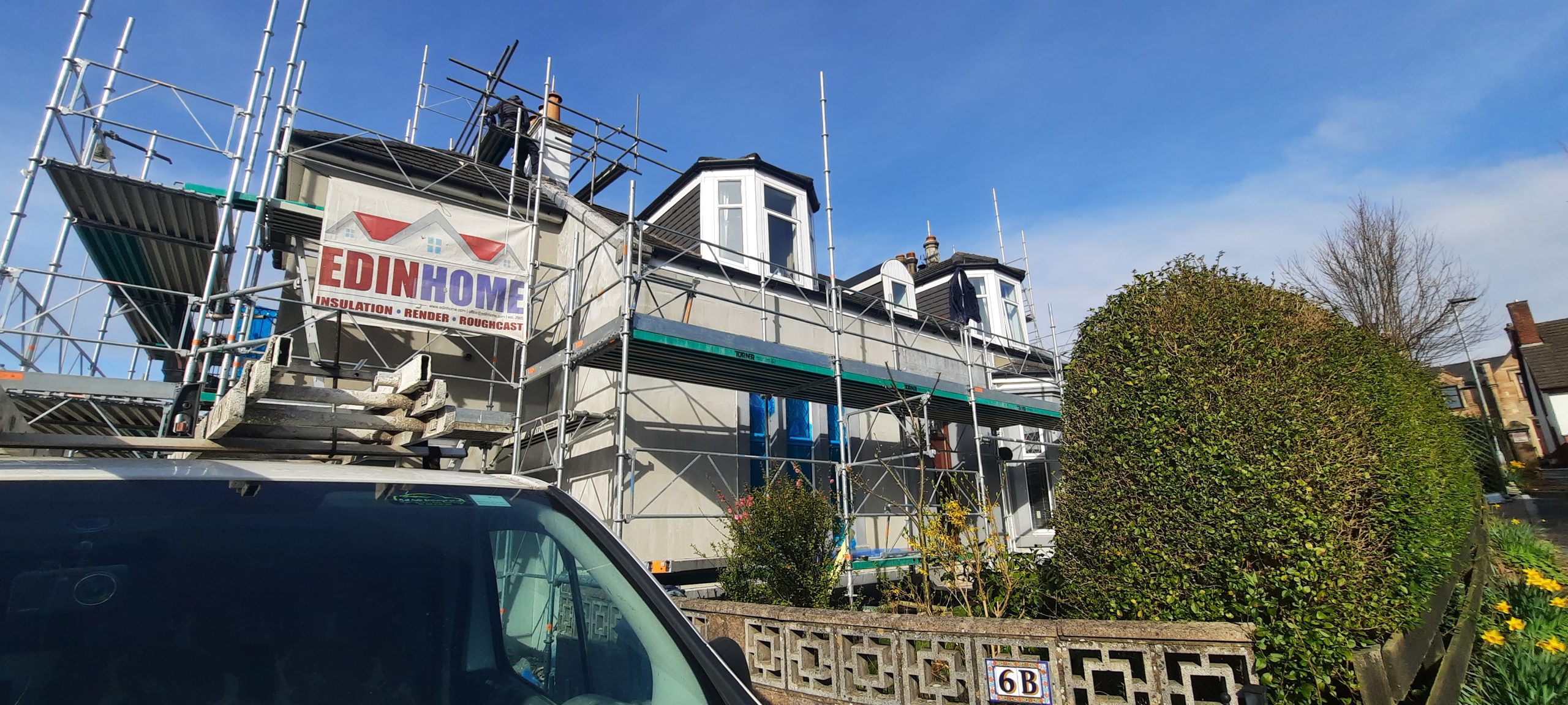 roughcast render repair on large detached house