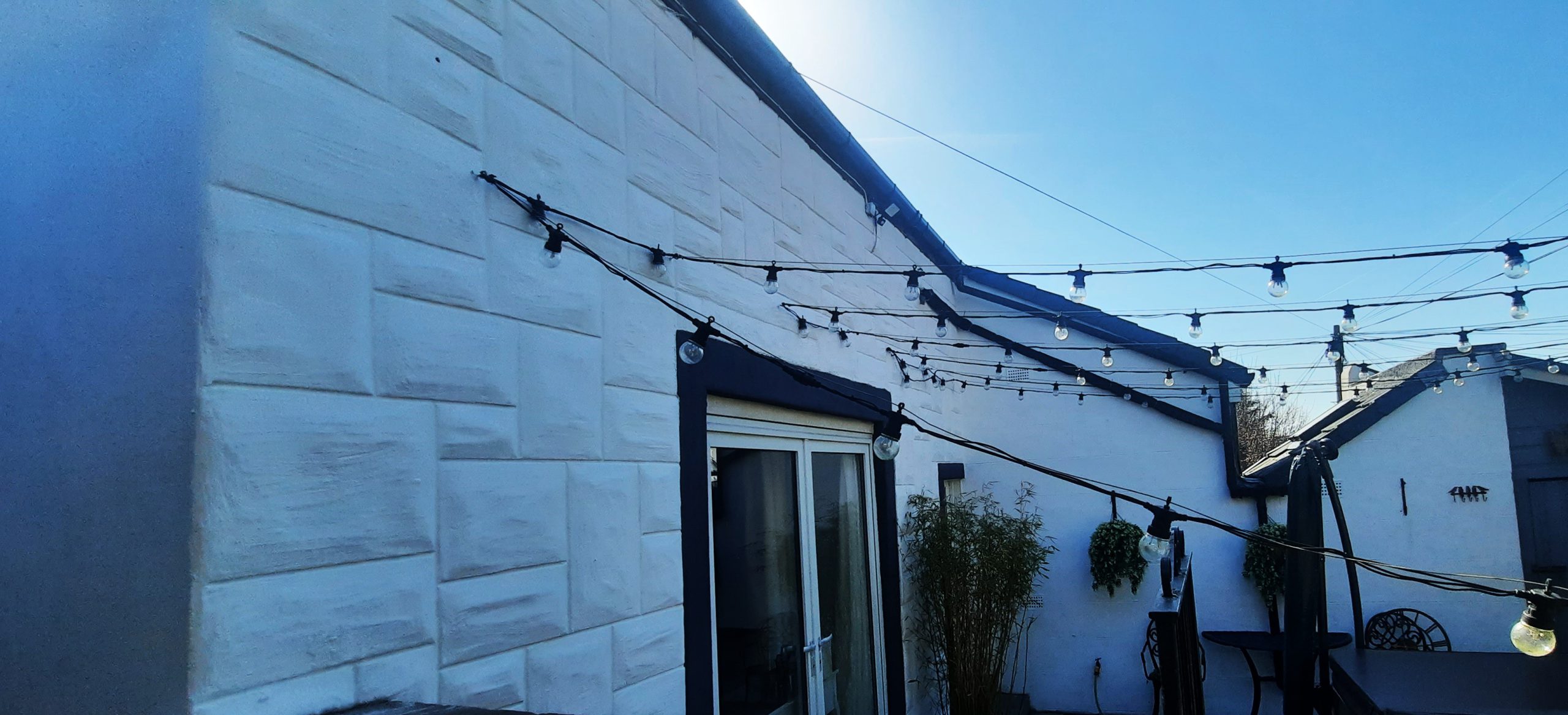roughcast render repair around patio doors