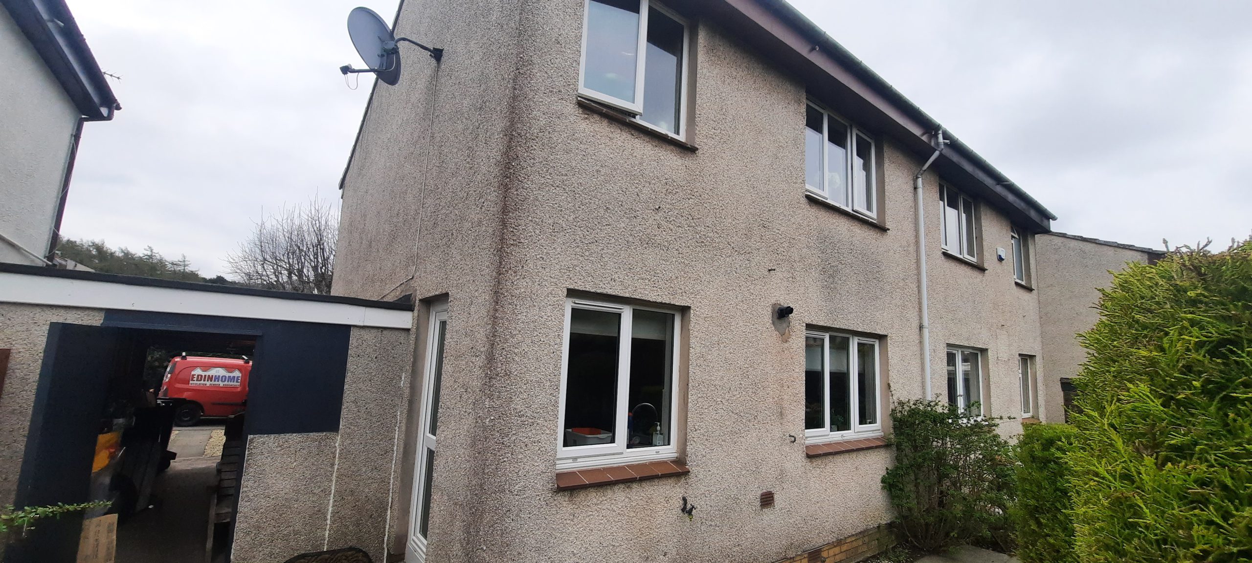 rear elevation of property with aged roughcast surface, prior to Insulation Edinburgh