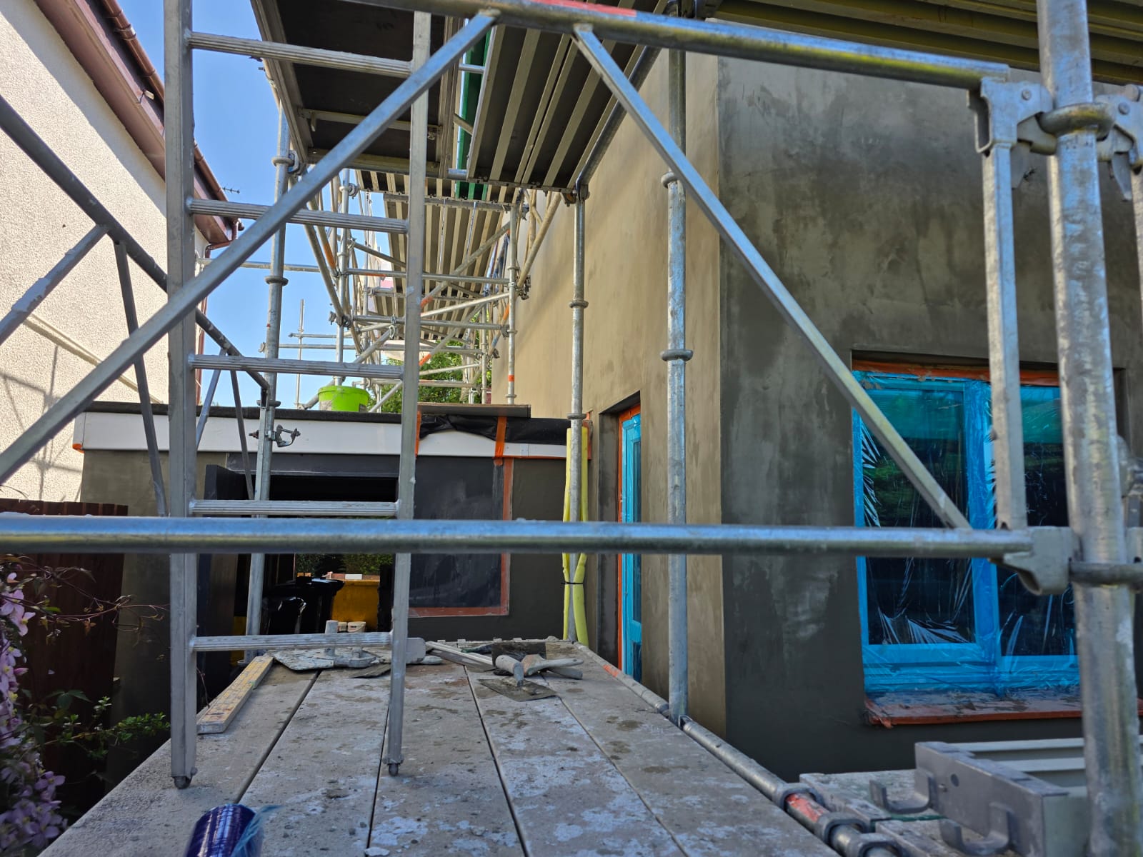 solid wall insulation Edinburgh installation underway with protective blue film