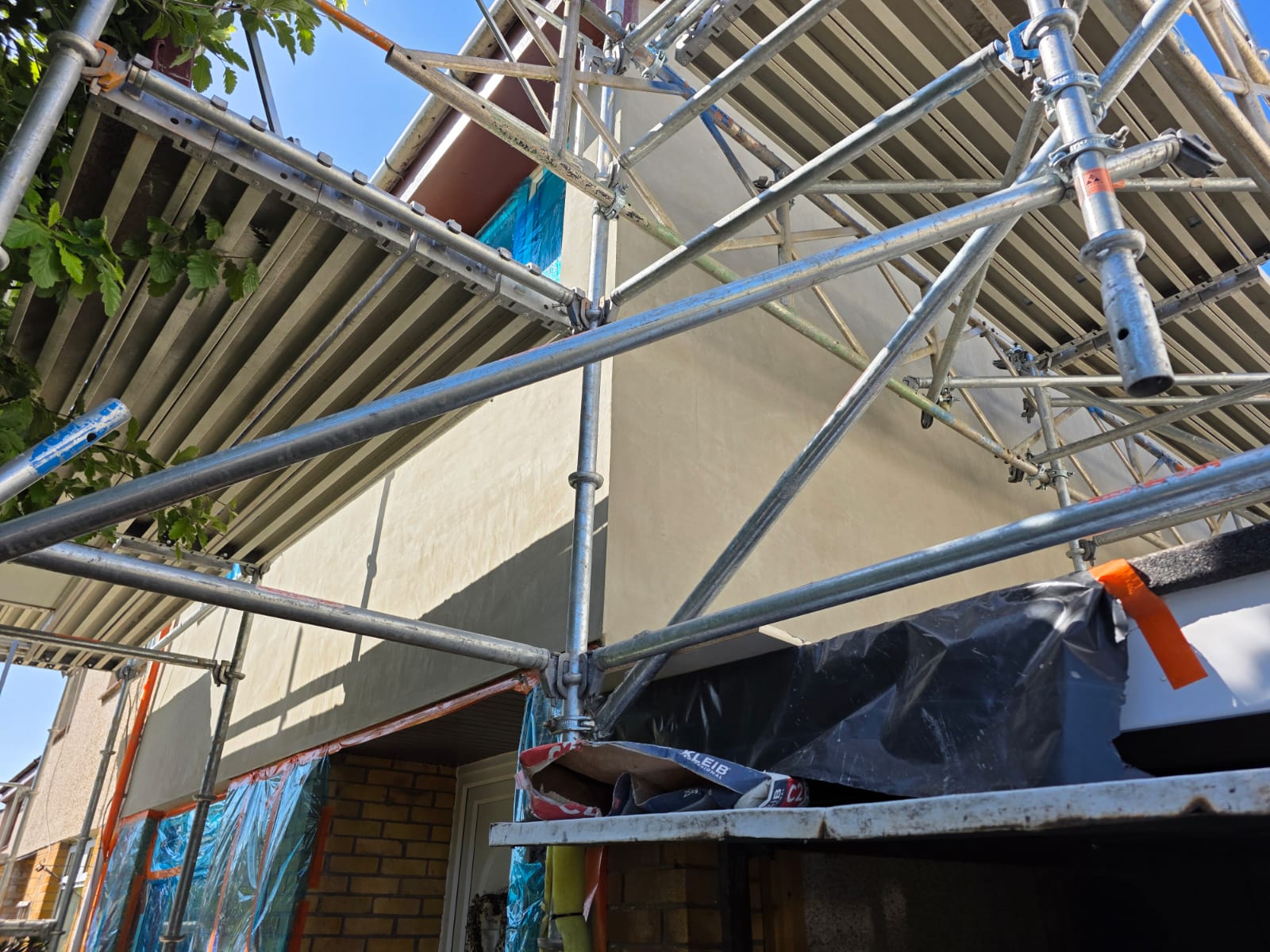 house undergoing Insulation Edinburgh installation with full scaffolding