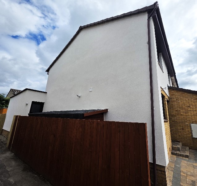 smooth side facade with new roughcast render Edinburgh application