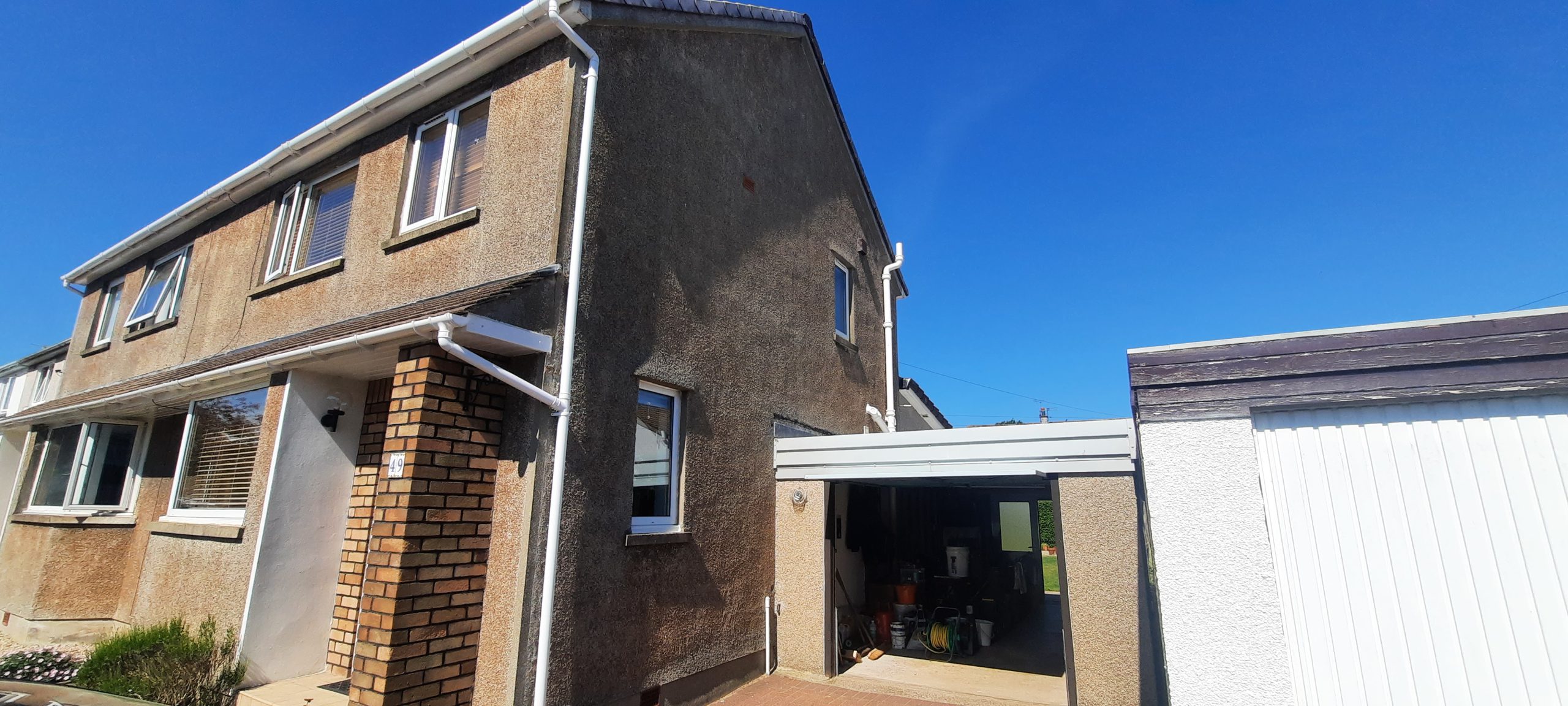house rendering Edinburgh project mid-stage with scaffolding in place