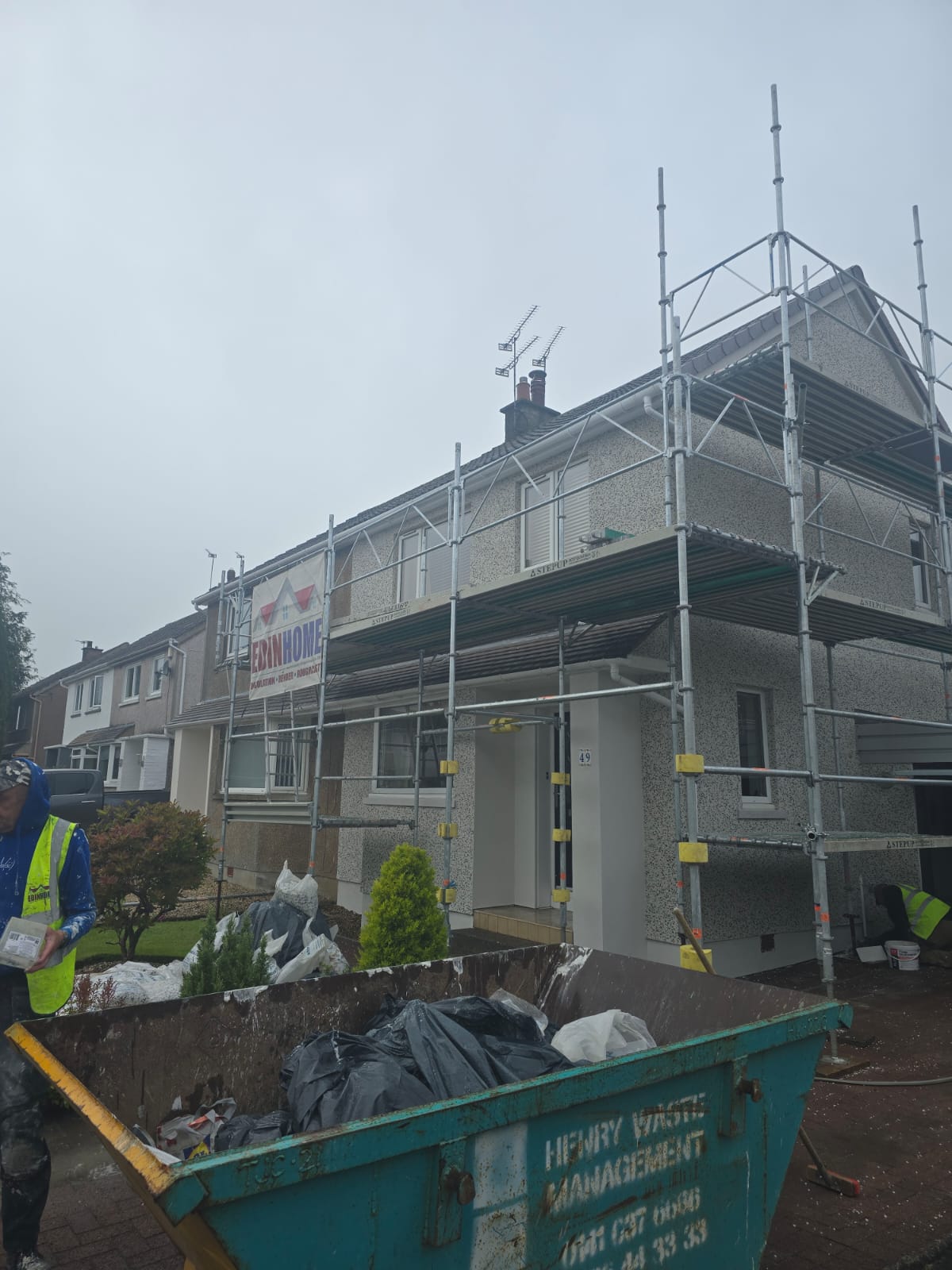 large-scale roughcasting Edinburgh works in progress across housing row