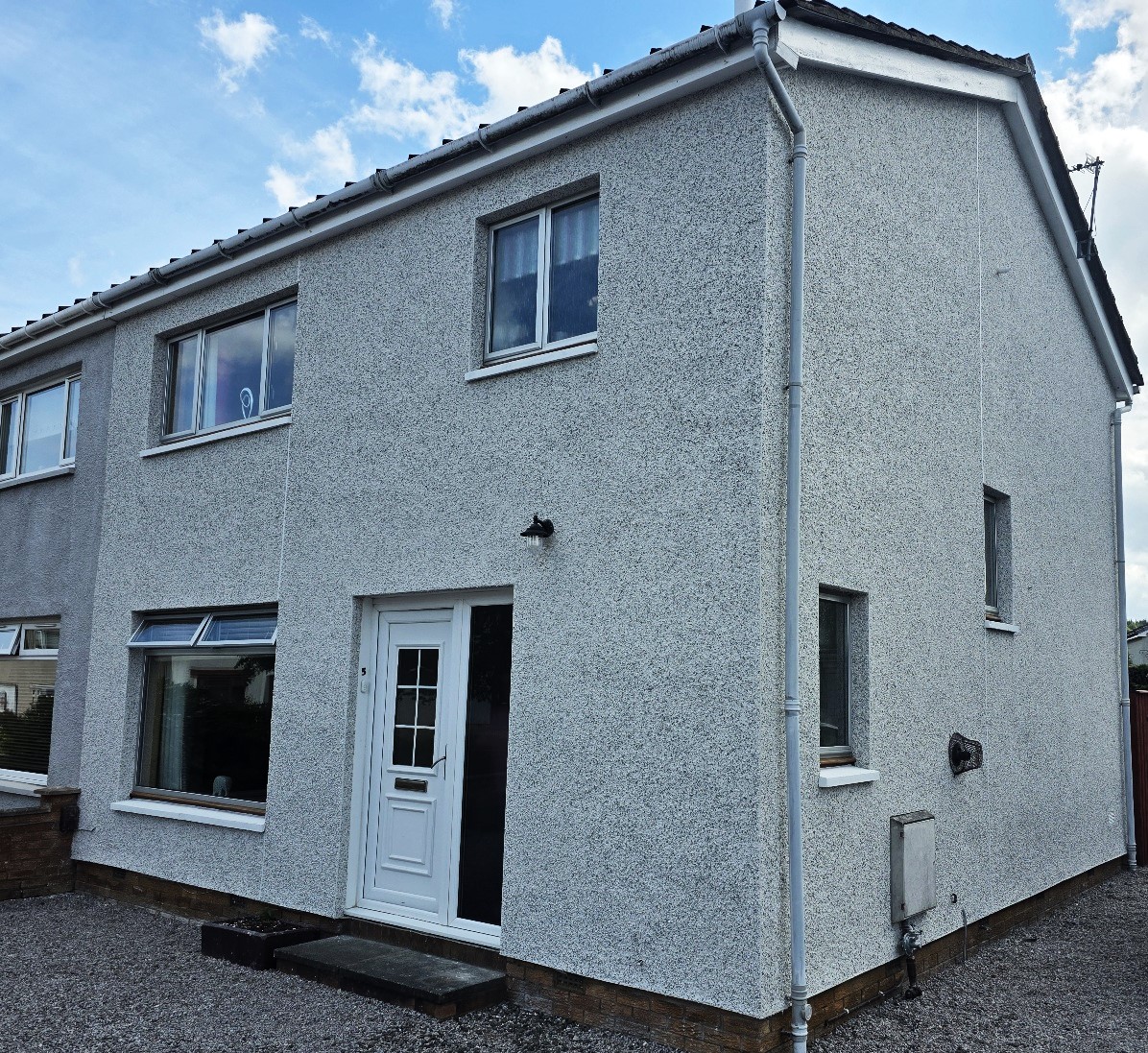 roughcaster Edinburgh completed exterior application on semi-detached home