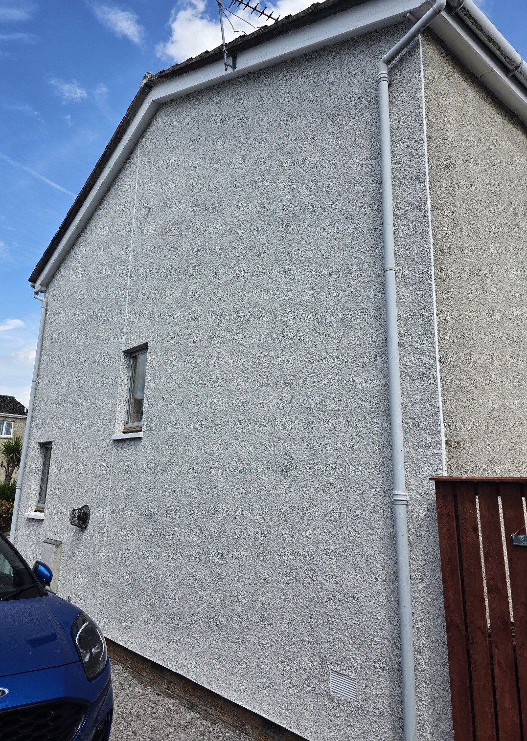 freshly applied roughcasting Edinburgh finish on gable wall