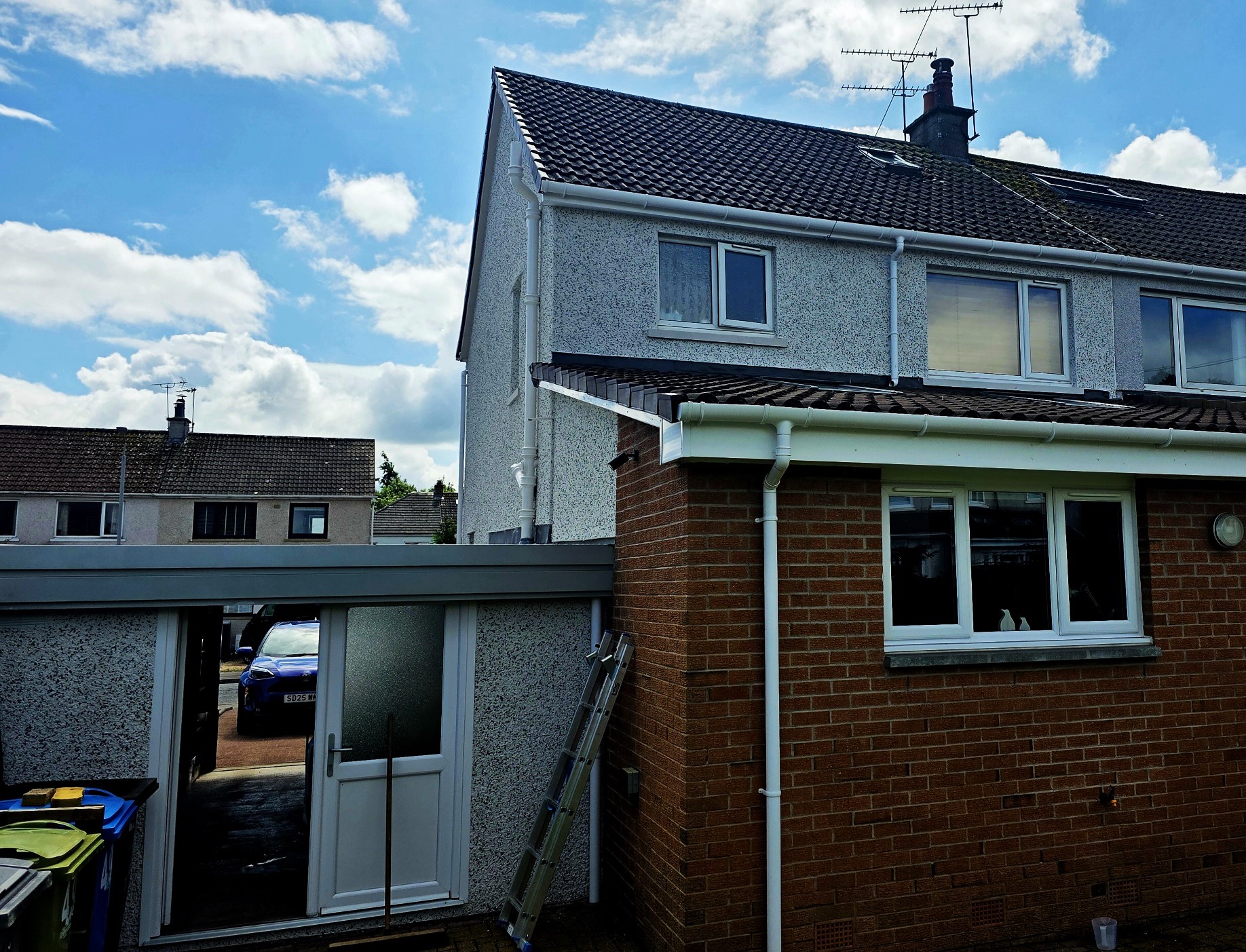 roughcaster Edinburgh working on side and rear extension walls