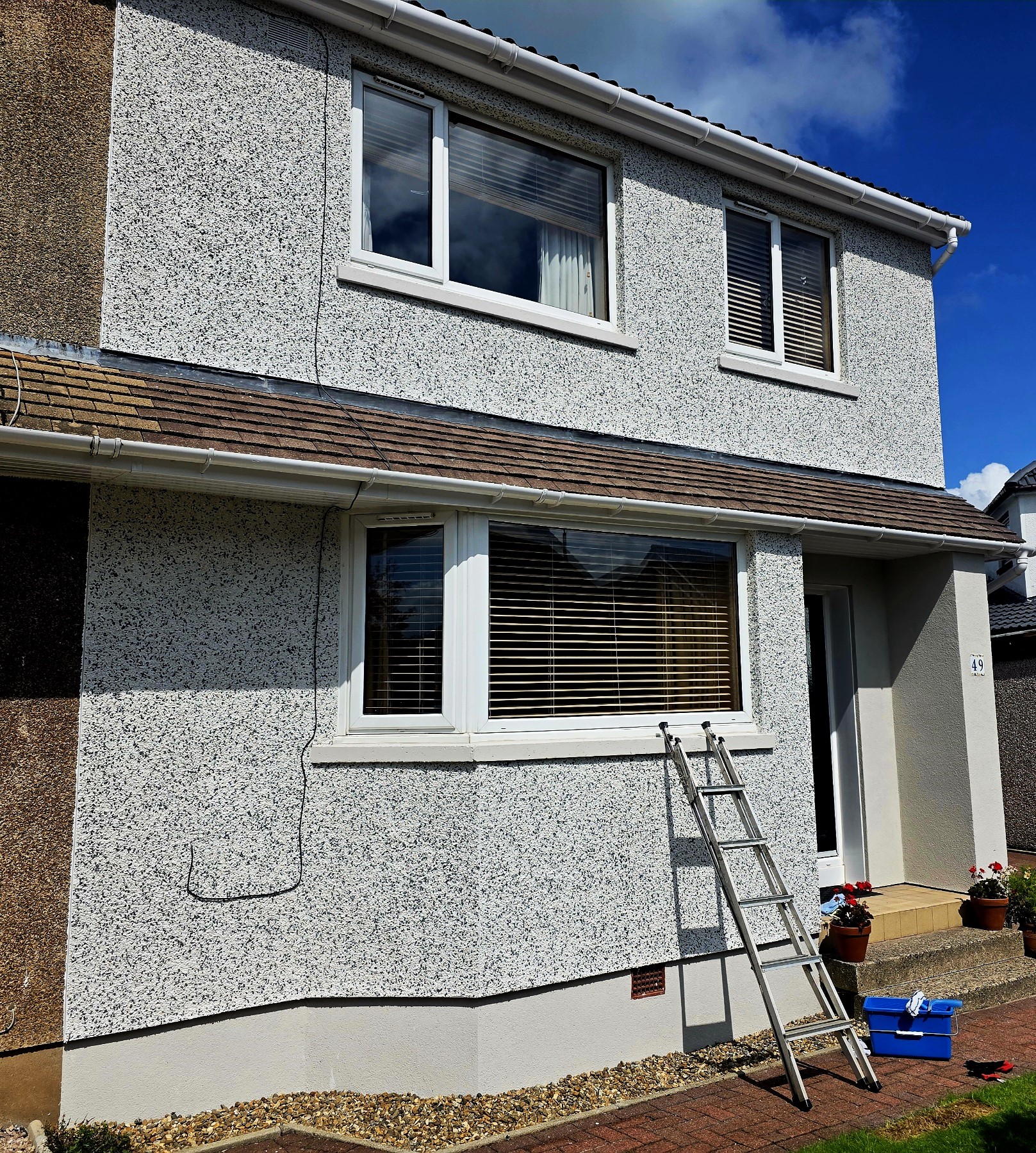 roughcasting Edinburgh project with fresh coating on upper facade